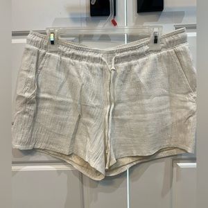 Fully lined cream shorts, making room in closet